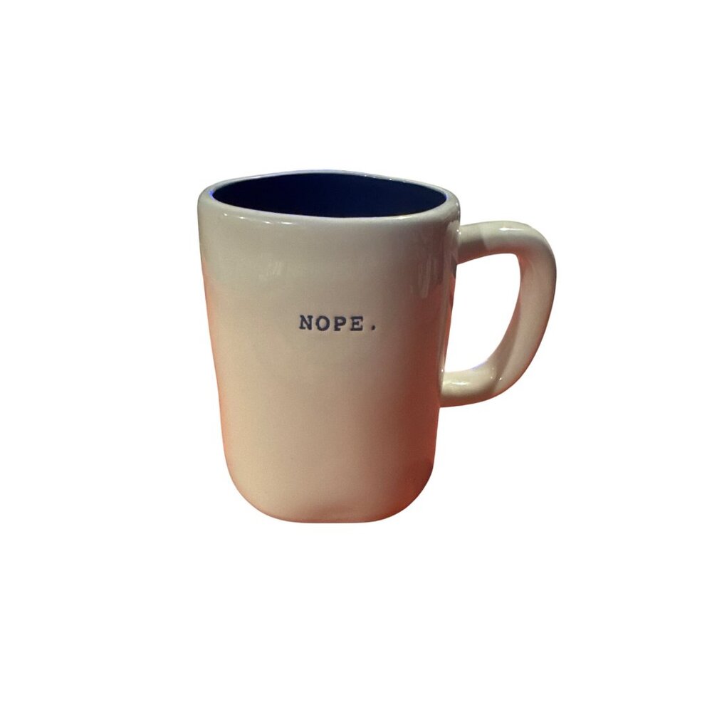 Rae Dunn by Magenta coffee mug with the word "NOPE." printed on it